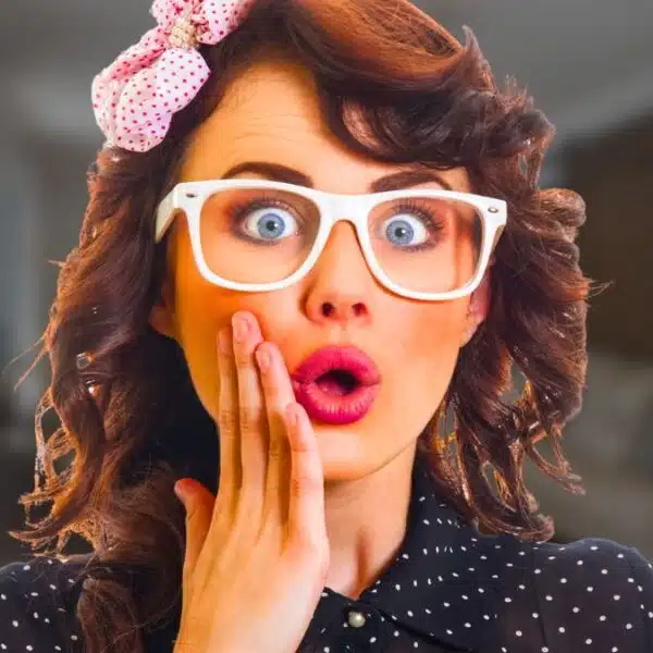 woman surprised at home glasses