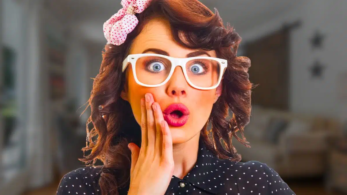 woman surprised at home glasses