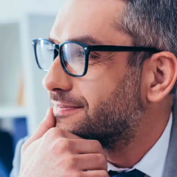businessman glasses office thinking