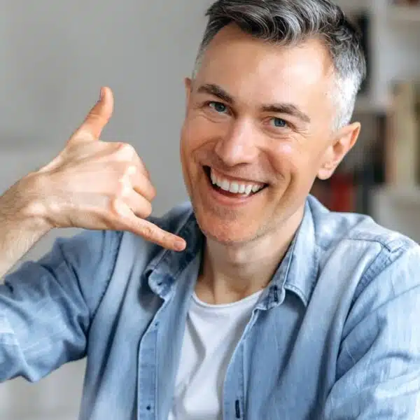 man smiling home office