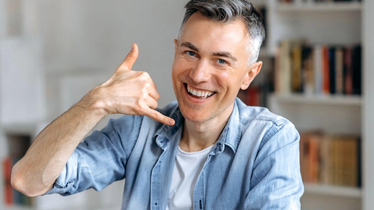 man smiling home office