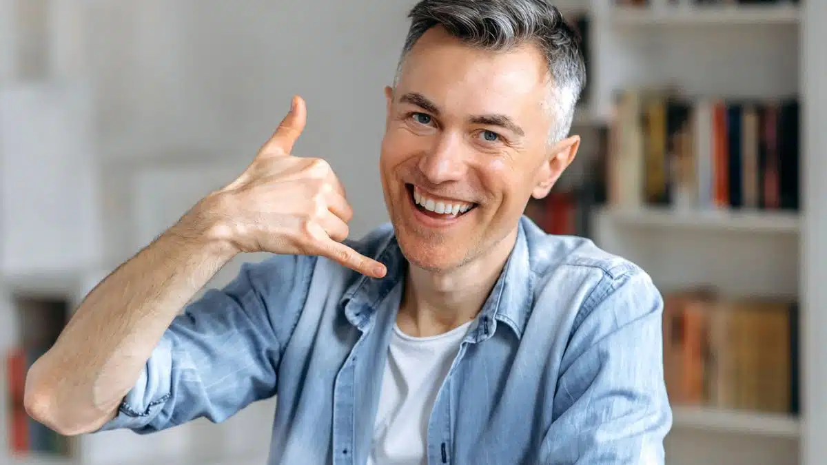man smiling home office