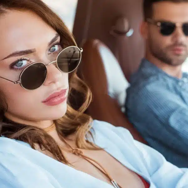 woman and man in car upset