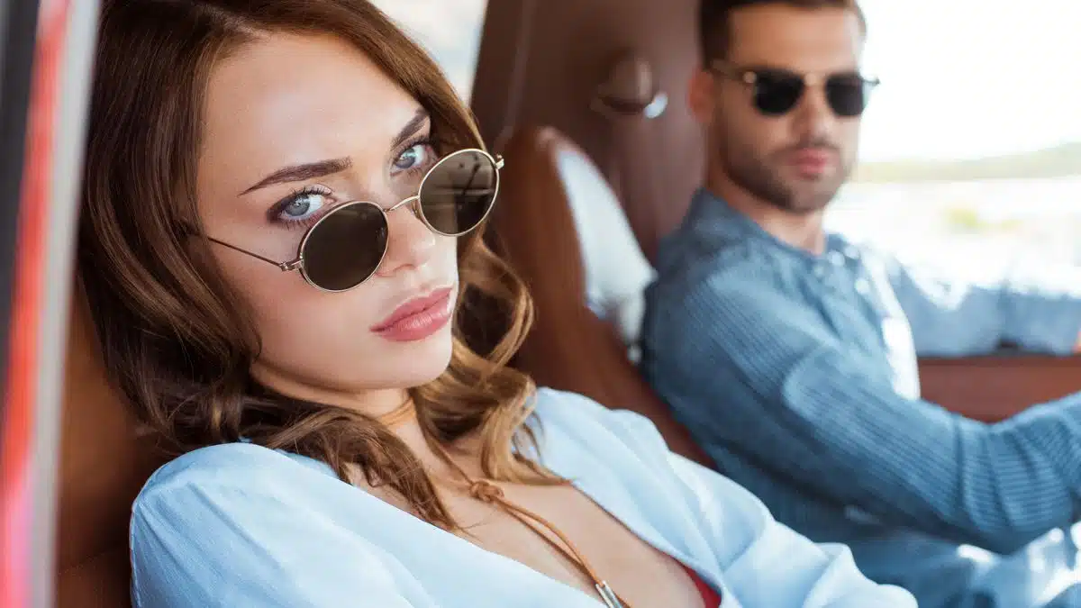 woman and man in car upset
