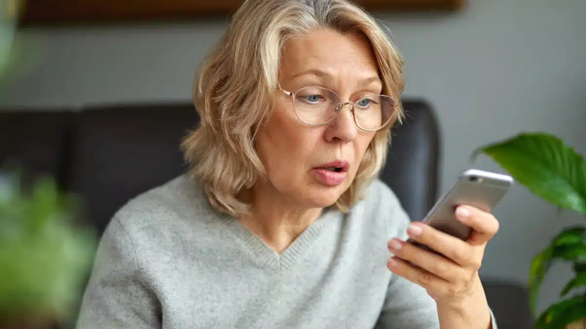 woman shocked on the phone
