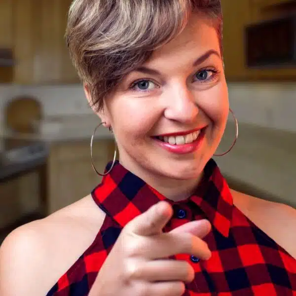 woman smiling in the kitchen