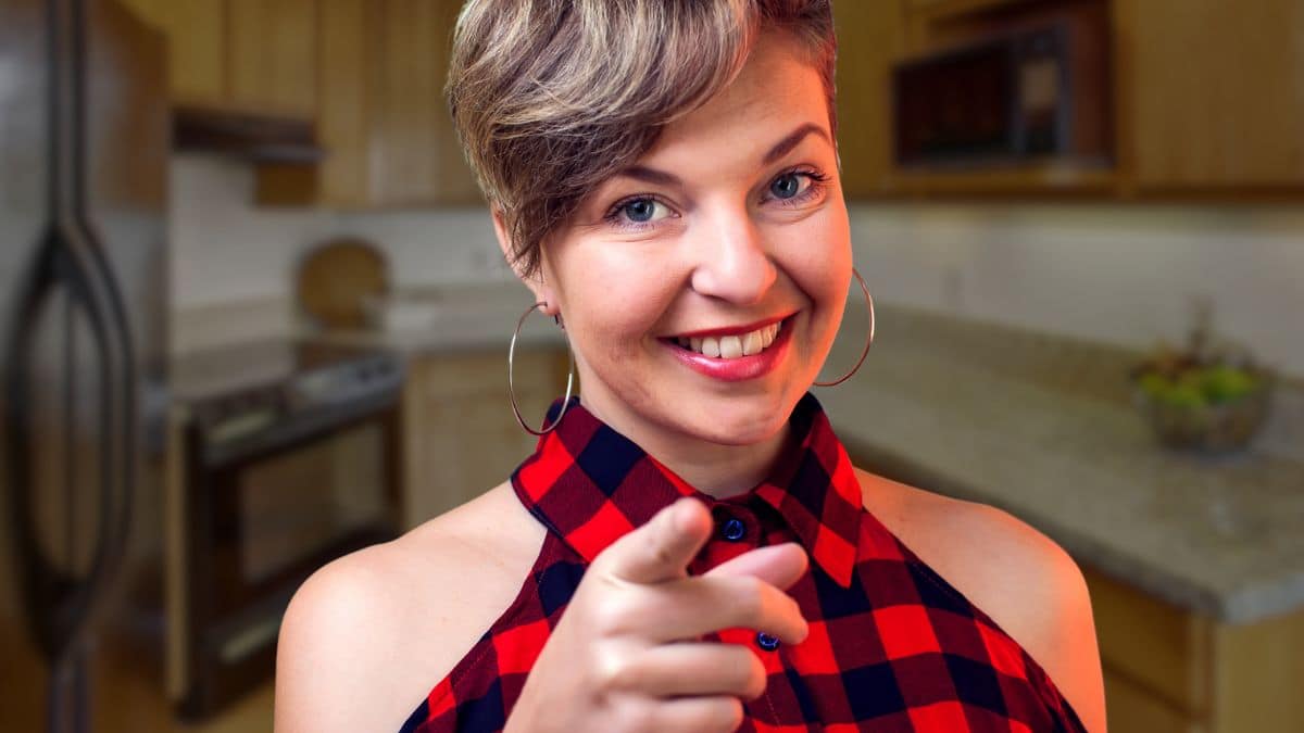 woman smiling in the kitchen
