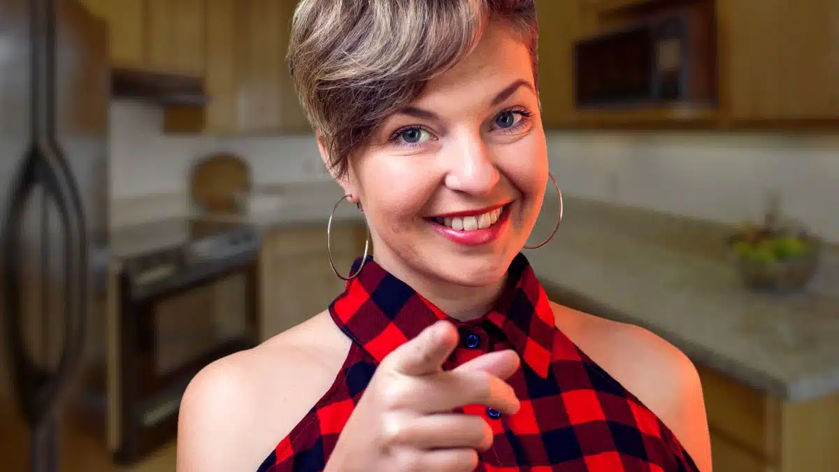 woman smiling in the kitchen