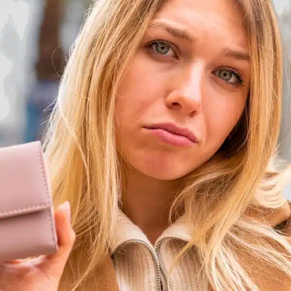 woman wallet credit card sad