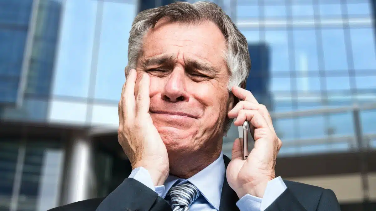 business man stressed on phone