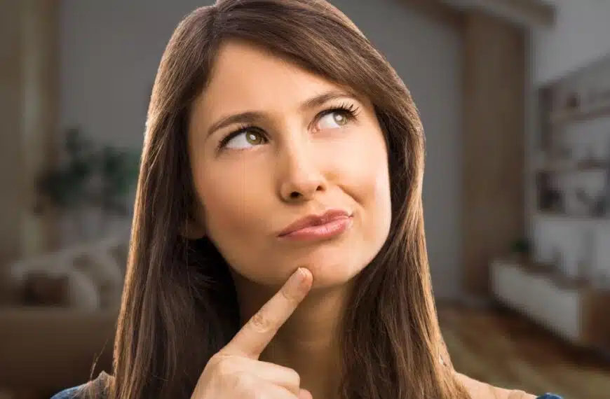 woman at home thinking to herself