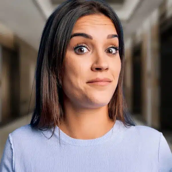 woman hands up confused