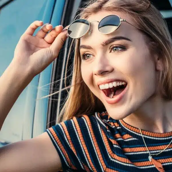 woman pasenger car sunglasses