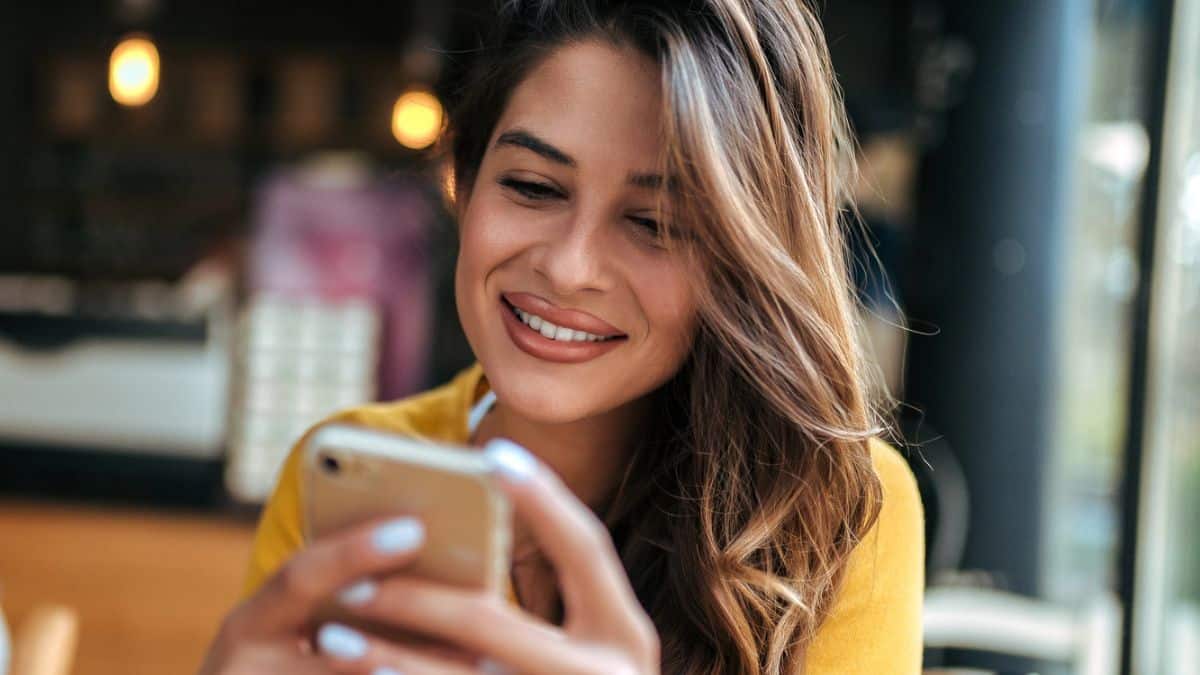 woman phone coffee shop sitting
