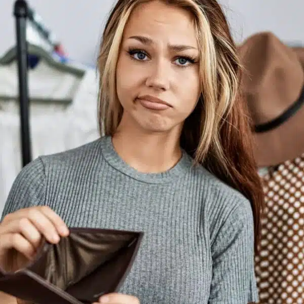 woman sad empty wallet
