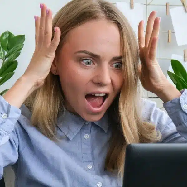 woman shouting at laptop