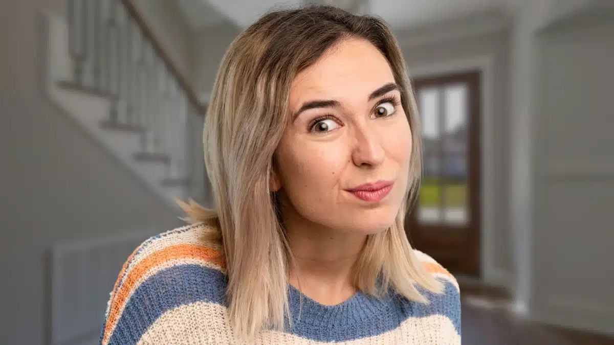 woman shy wearing a sweater colorful