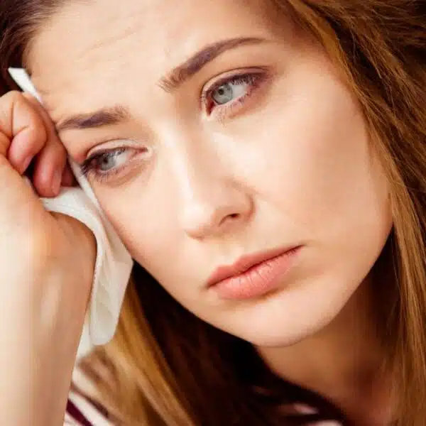 woman stressed alone thinking