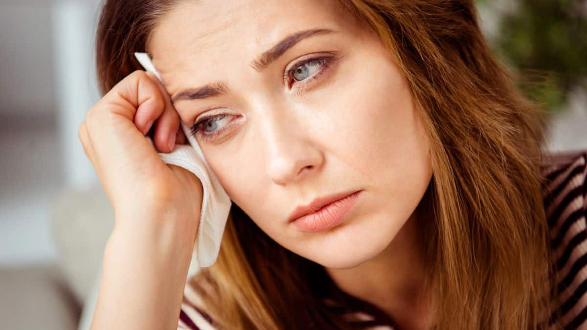 woman stressed alone thinking