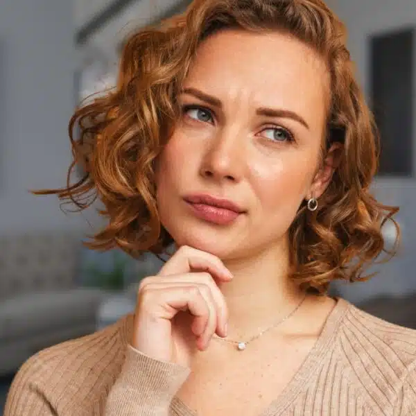 woman thinking sad regret