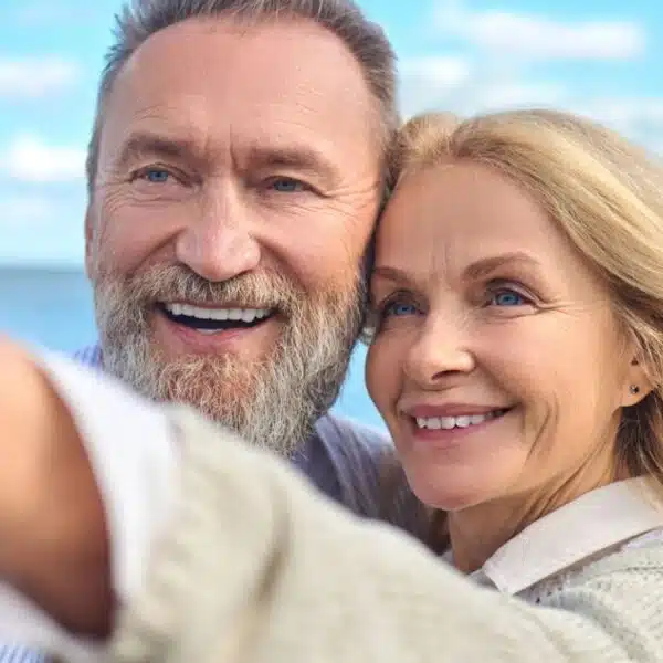couple mature travel smiling