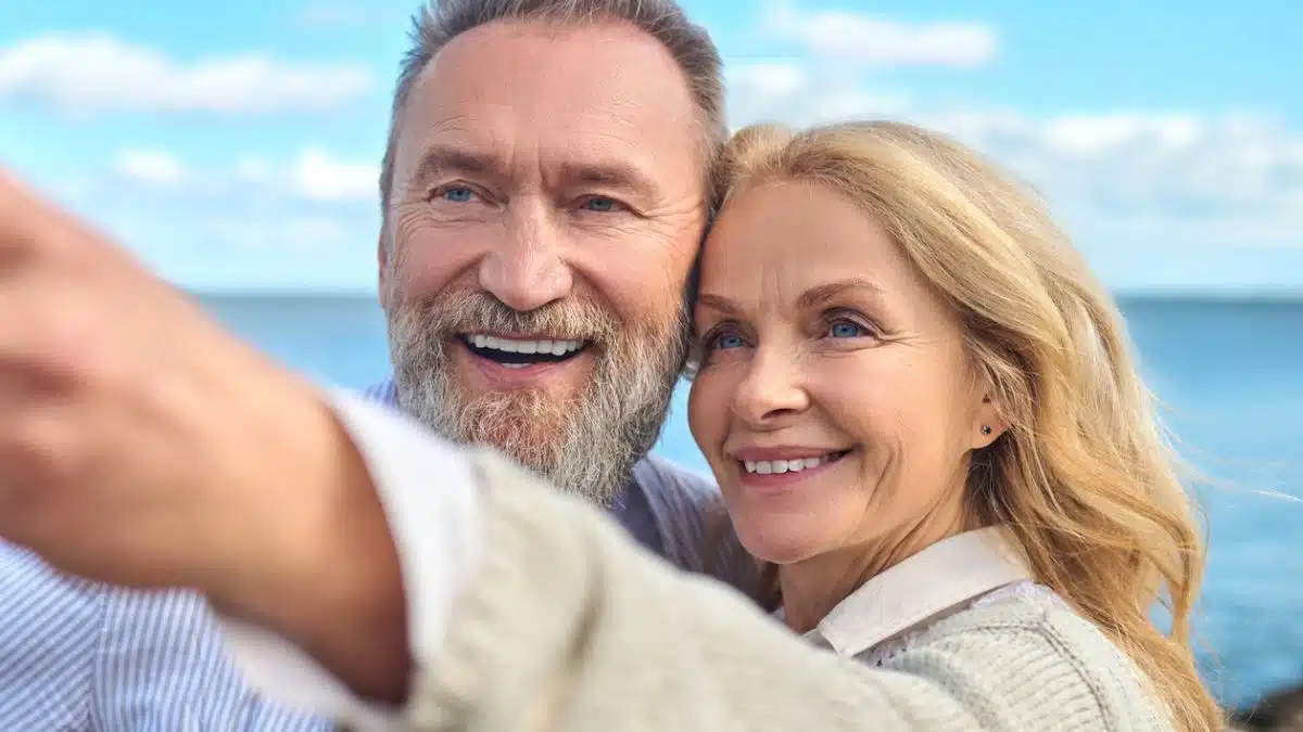couple mature travel smiling