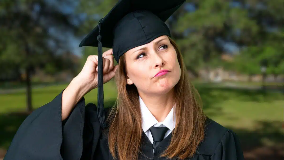 graduate woman thinking