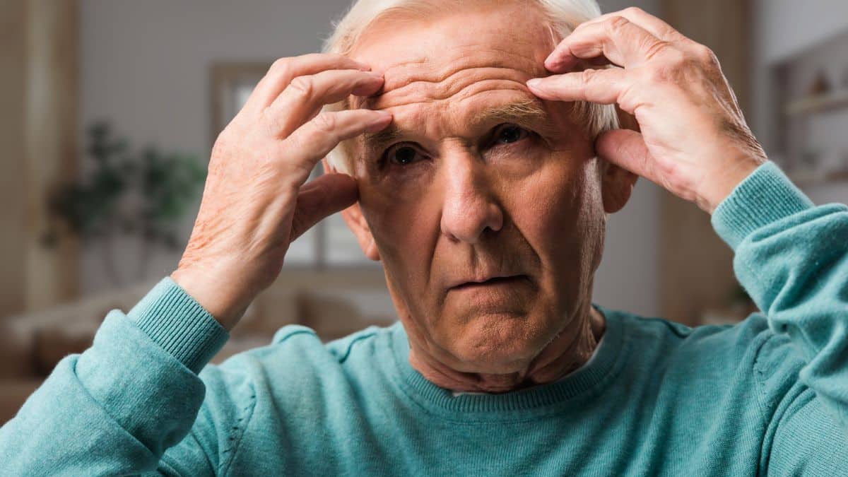 senior man worried stressed tired