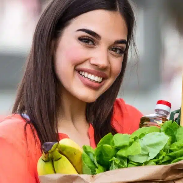 woman holding groceries