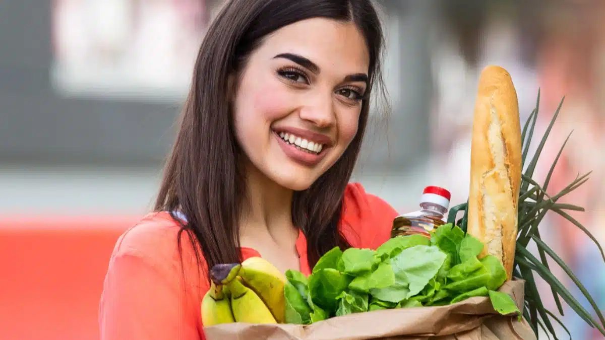 woman holding groceries