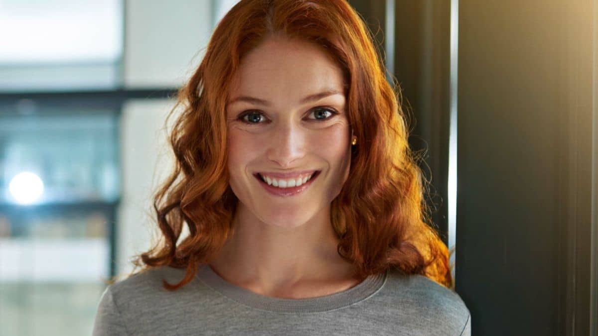 woman smiling at work office working