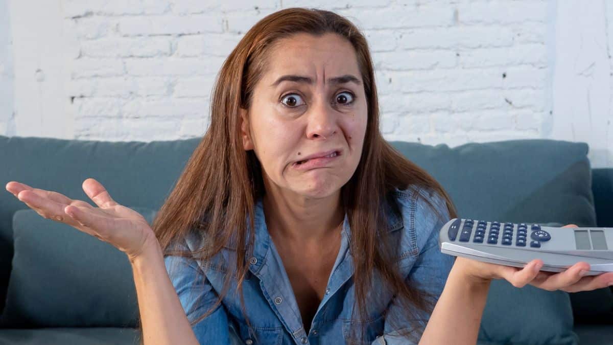 woman stressed calculator budget