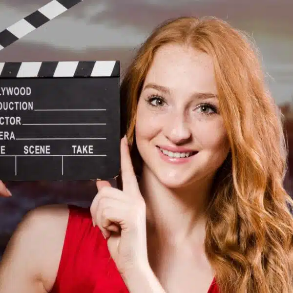 actress holding up sign