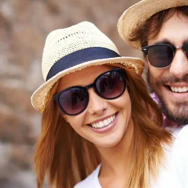couple sungleasses smile
