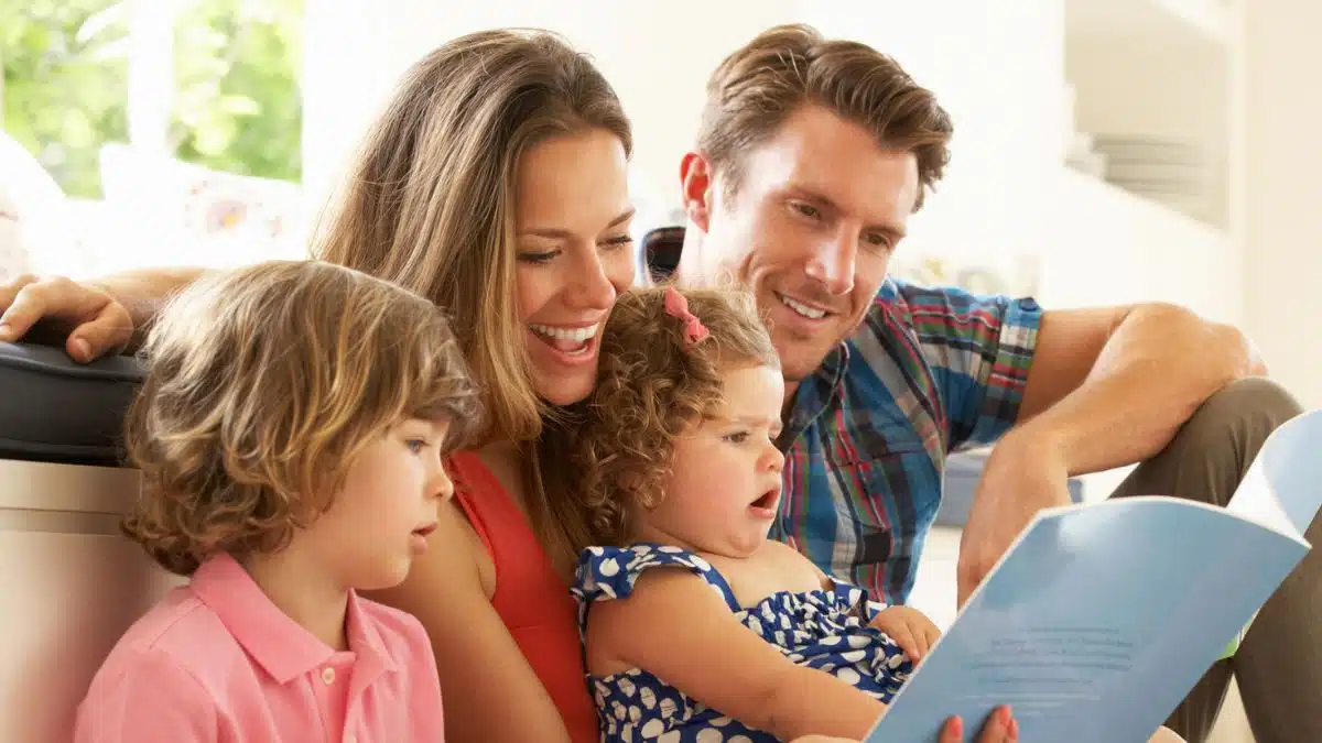 family reading a book