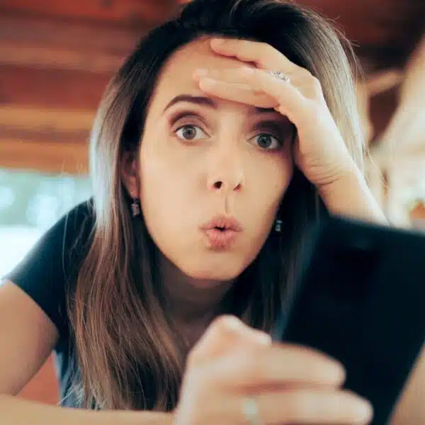 woman surprised with phone