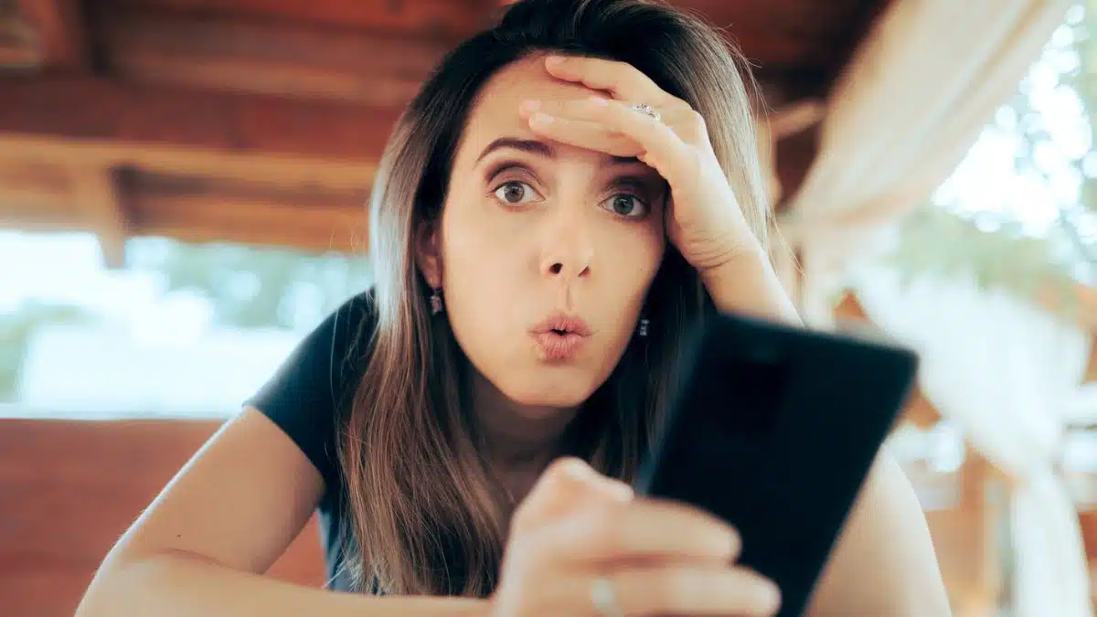 woman surprised with phone