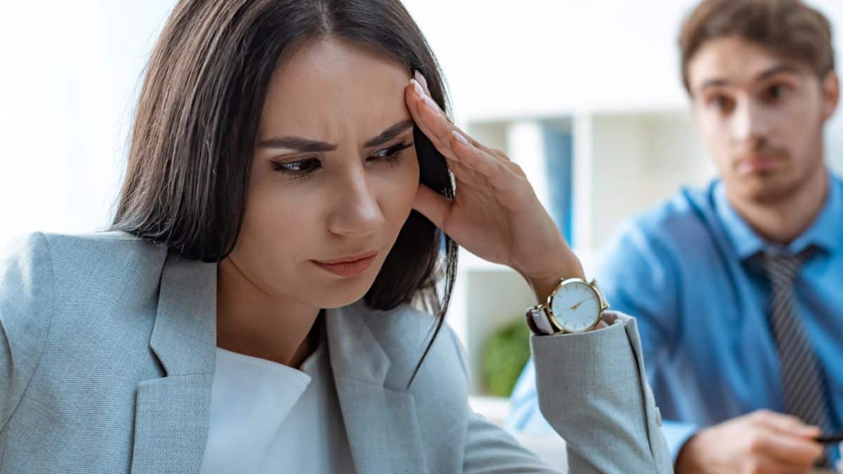 woman working office worried not having a good day