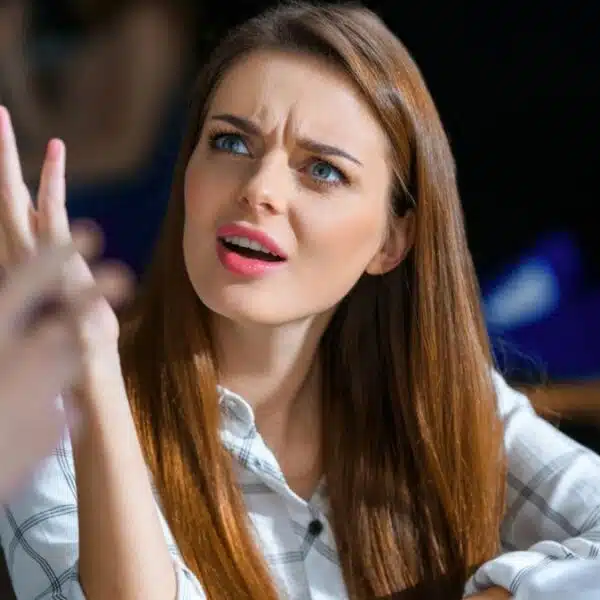 brunette woman upset at work