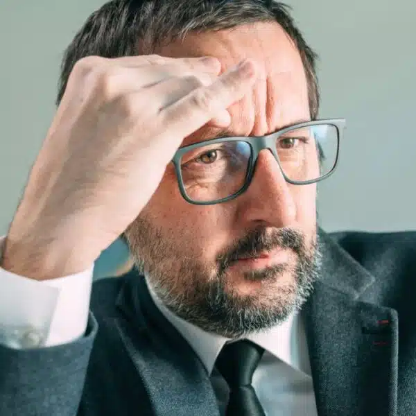business man glasses stressed out