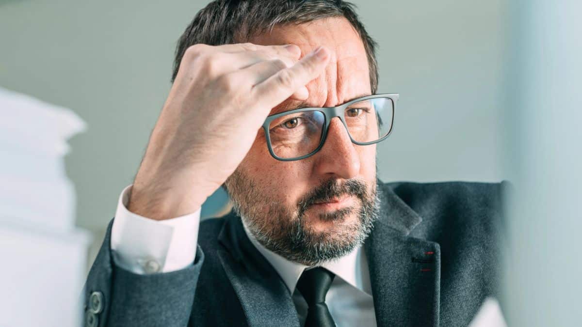 business man glasses stressed out