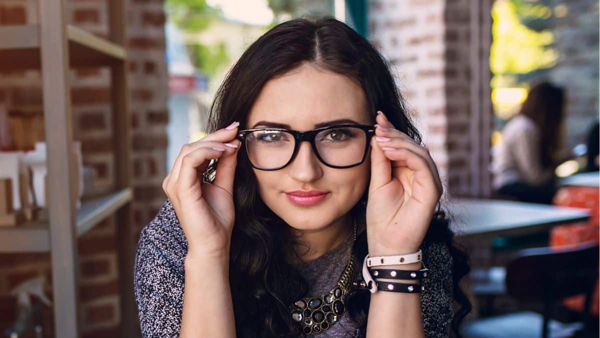 woman glasses coffee shop staring