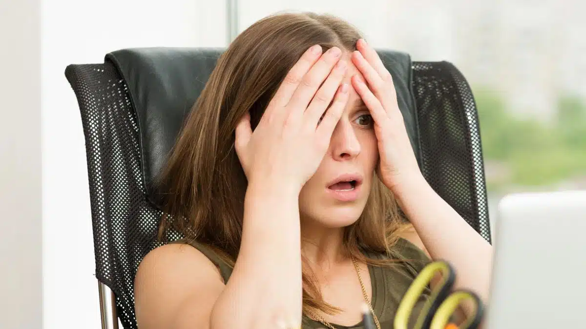 woman stunned at work