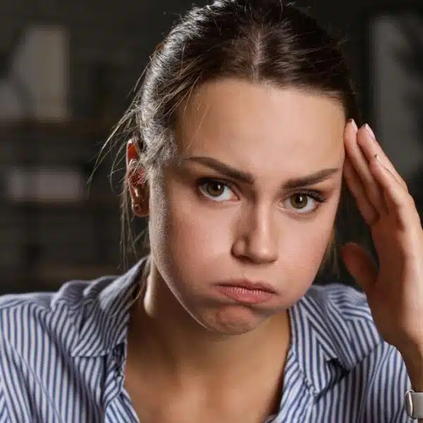 woman upset at desk
