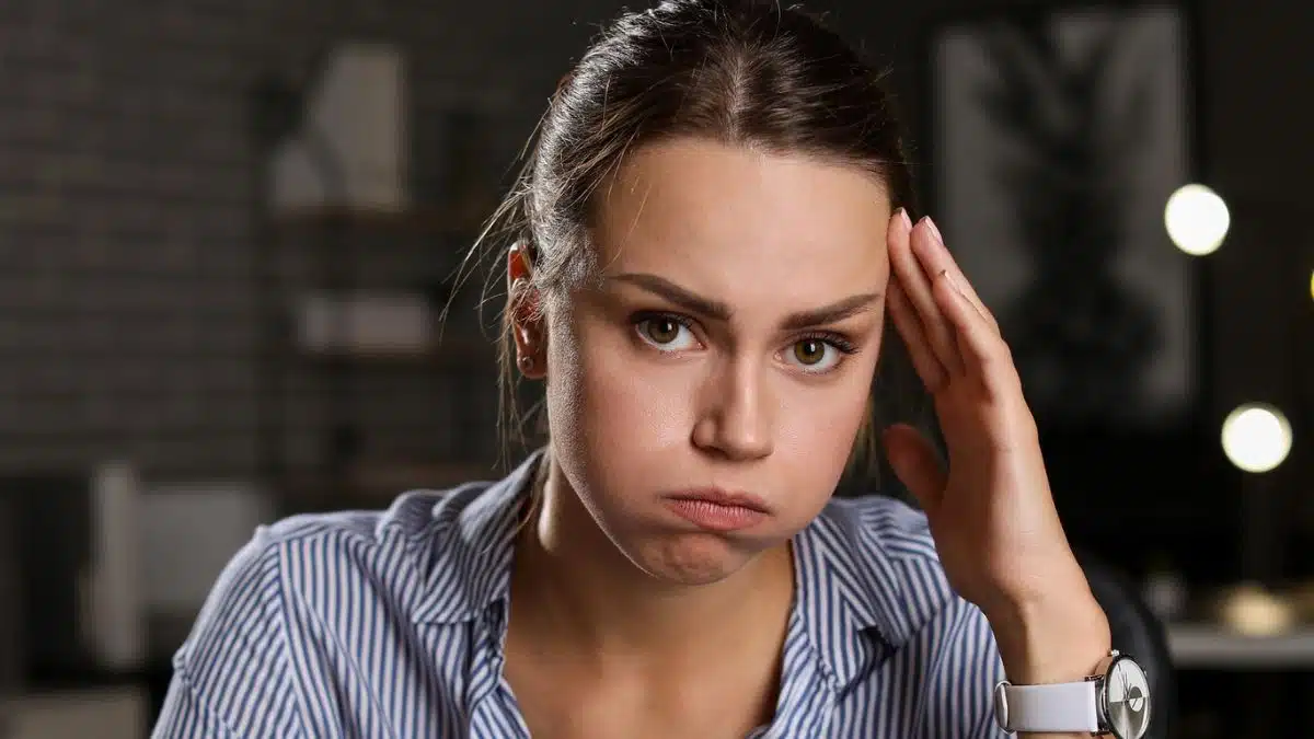 woman upset at desk
