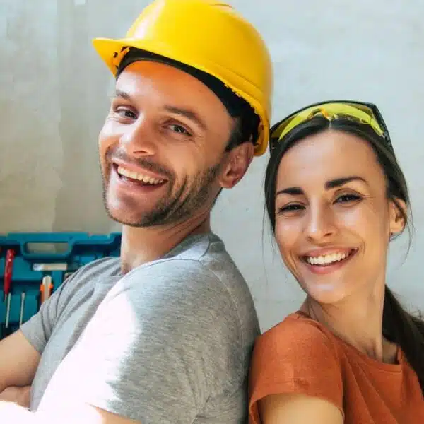 couple repairing their home
