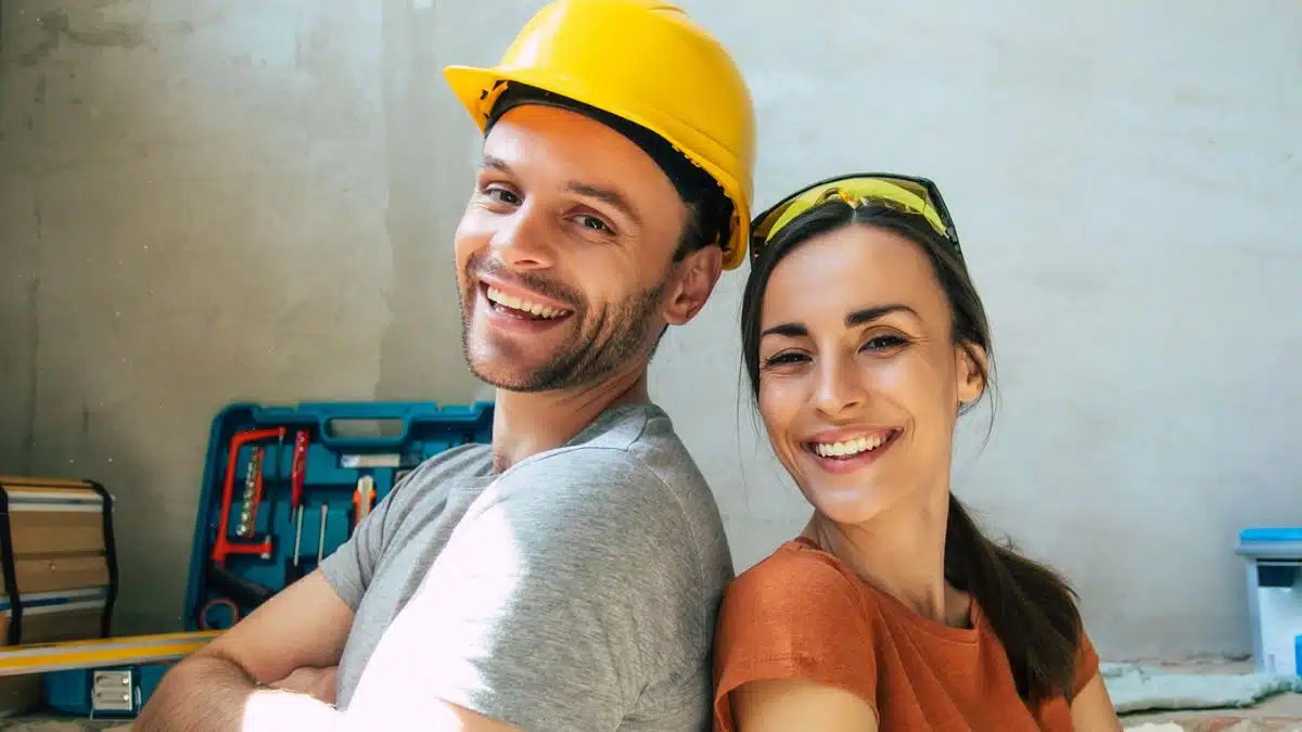 couple repairing their home