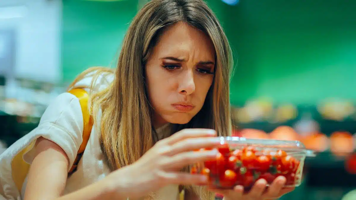 woman confused at grocery store