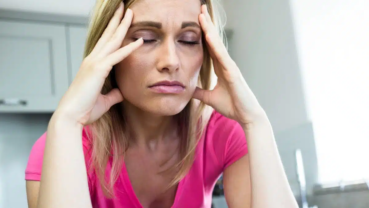 woman stressed in her kitchen