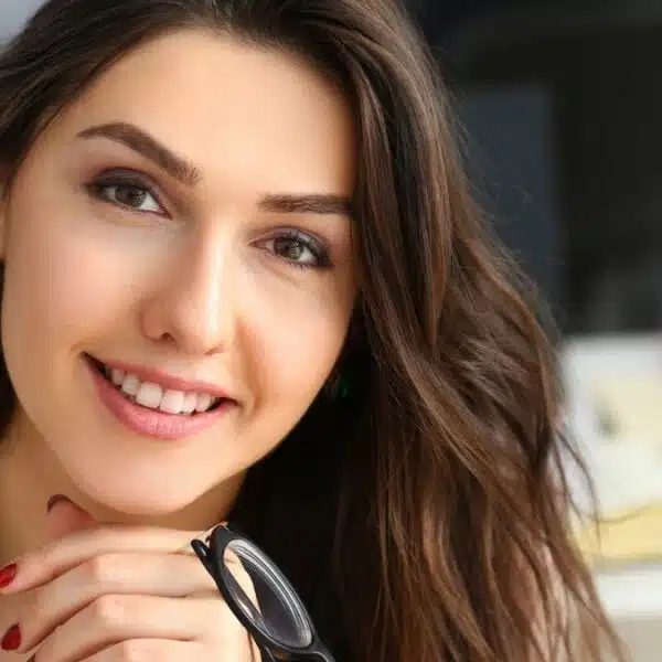 woman working in the office with glasses